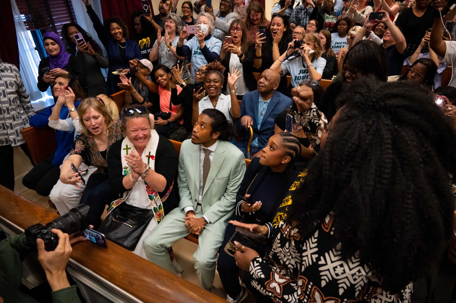 Rep. Justin Jones watches as the Metro Council votes to return him to his seat, April 10, 2023